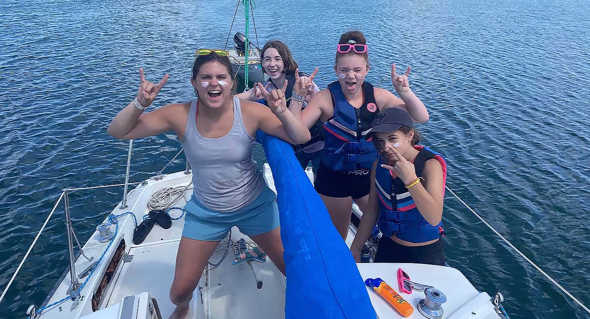 Girls sailing together during an Acadia adventure